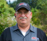 Image of norm stokes amsoil dealer a few years ago sporting his official amsoil attire